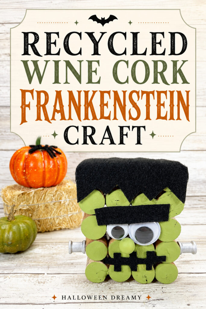Recycled wine cork Frankenstein craft with green painted corks, wiggle eyes, black felt hair, silver neck bolts, and pumpkins.